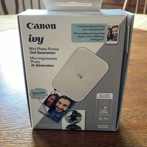 Canon brand Ivy Mini Printer and 3 boxes (20 per box) stickers.  BRAND NEW!!!